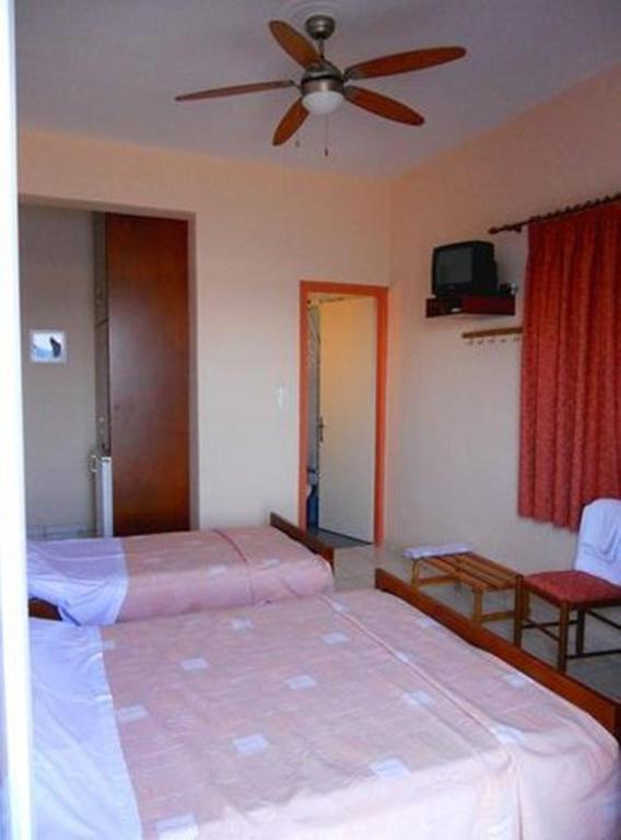 Apollon Hotel Tirós Rum bild