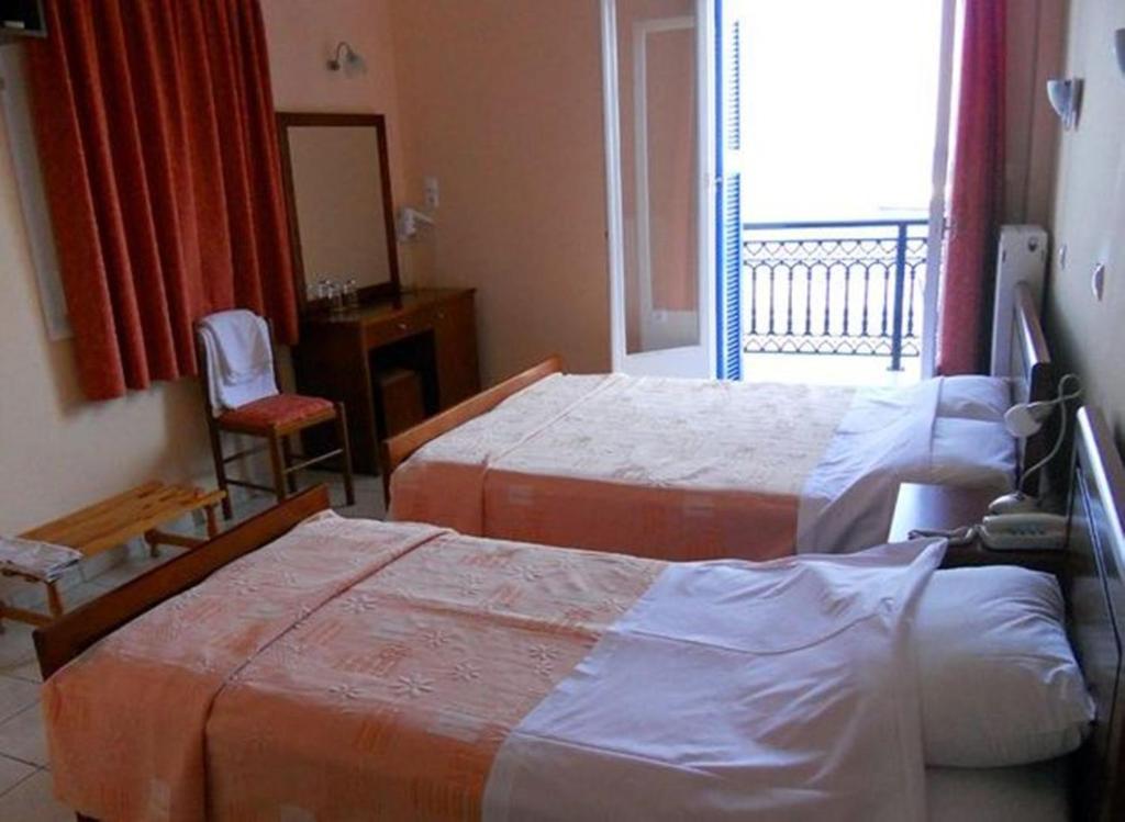 Apollon Hotel Tirós Rum bild